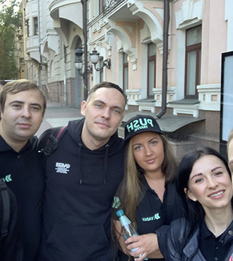 Our diverse team at Evadav working together on cutting-edge technology projects