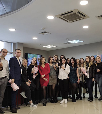 Our diverse team at Evadav working together on cutting-edge technology projects