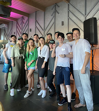 Our diverse team at Evadav working together on cutting-edge technology projects